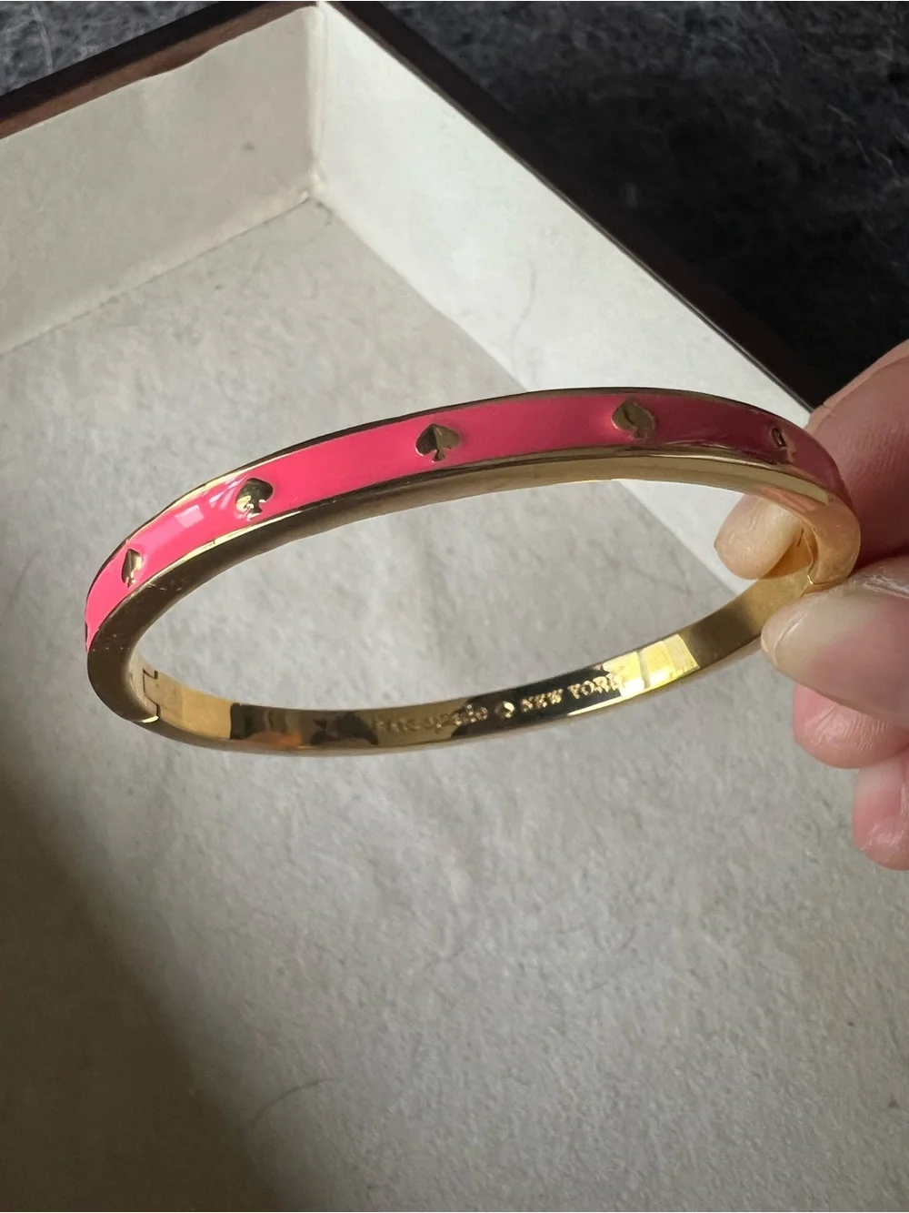 Kate Spade Gold-Tone Pink Heart Accent Bangle Bracelet - Picture 2 of 3
